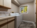 Laundry with detergent and dryer sheets provided